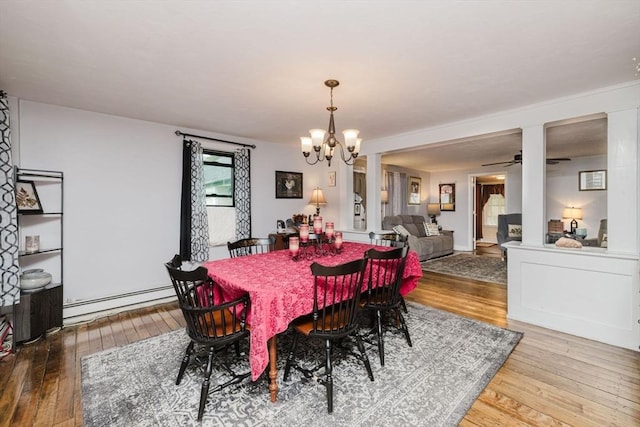 700 S Main St, Bellingham, MA 02019 - dining area featuring hardwood / wood-style flooring, a chandelier, baseboard heating, and ceiling fan