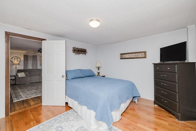 700 S Main St, Bellingham, MA 02019 - bedroom featuring light wood-style floors and crown molding