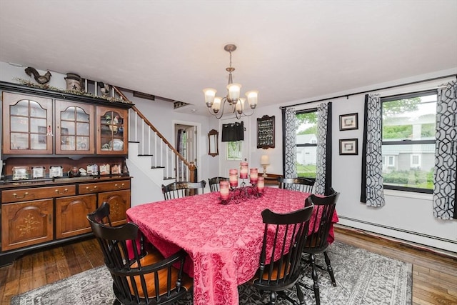 700 S Main St, Bellingham, MA 02019 - dining area with a chandelier, dark wood-style floors, stairs, and baseboard heating