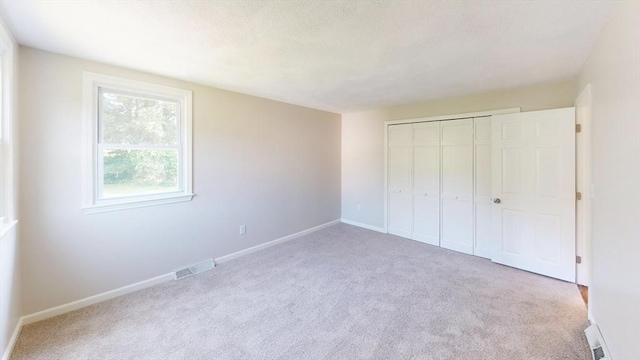 12 Sandra Ave, Burlington, MA 01803 - unfurnished bedroom featuring carpet floors and a closet
