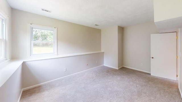 12 Sandra Ave, Burlington, MA 01803 - carpeted empty room with baseboards