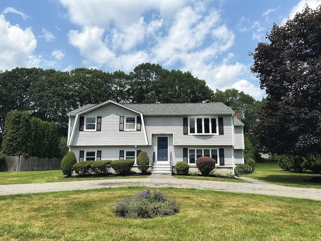 12 Sandra Ave, Burlington, MA 01803 - bi-level home with curved driveway and view of wooded area