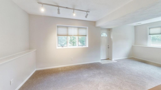 12 Sandra Ave, Burlington, MA 01803 - unfurnished room featuring rail lighting and carpet