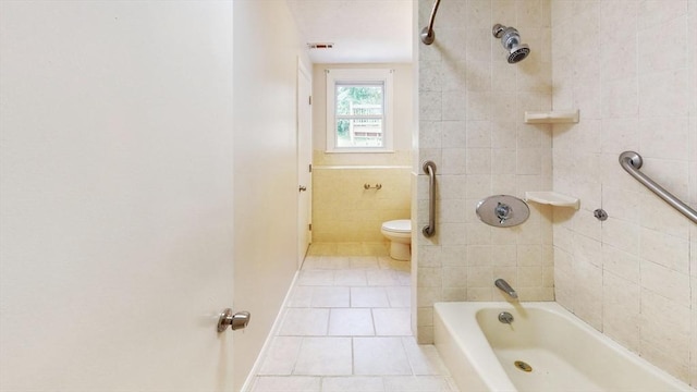 12 Sandra Ave, Burlington, MA 01803 - full bath with tile patterned flooring, tile walls, and bathtub / shower combination