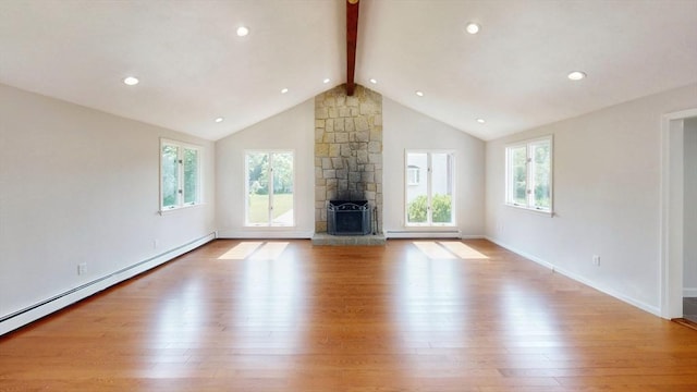 12 Sandra Ave, Burlington, MA 01803 - unfurnished living room with a baseboard radiator, wood finished floors, healthy amount of natural light, and recessed lighting