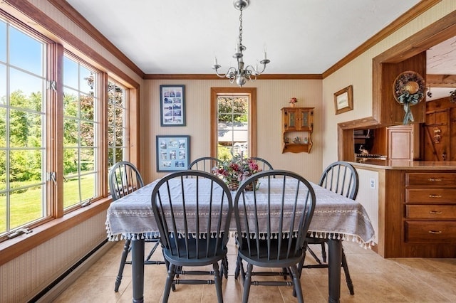 dining area with a wealth of natural light, crown molding, a baseboard heating unit, and an inviting chandelier