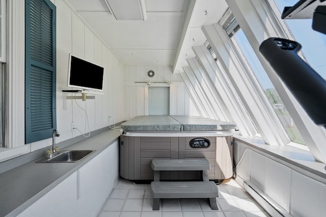 interior space with sink and wooden walls