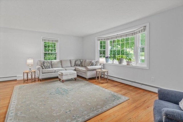 24 Stagecoach, Medfield, MA 02052 - living area with a baseboard heating unit and wood finished floors