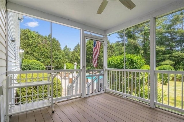 24 Stagecoach, Medfield, MA 02052 - unfurnished sunroom with ceiling fan and view of wooded area