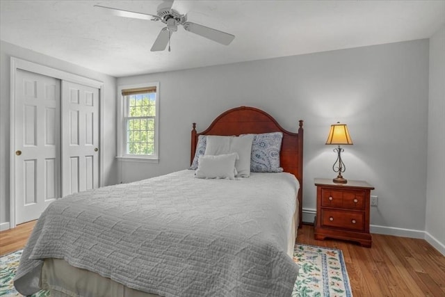 24 Stagecoach, Medfield, MA 02052 - bedroom featuring baseboard heating, wood finished floors, a closet, and ceiling fan