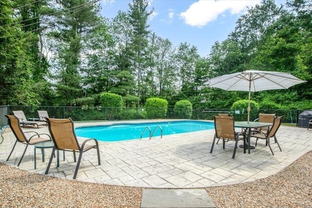 24 Stagecoach, Medfield, MA 02052 - view of swimming pool with a patio and view of scattered trees