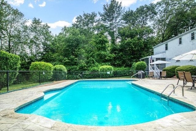 24 Stagecoach, Medfield, MA 02052 - view of swimming pool with a patio and view of wooded area