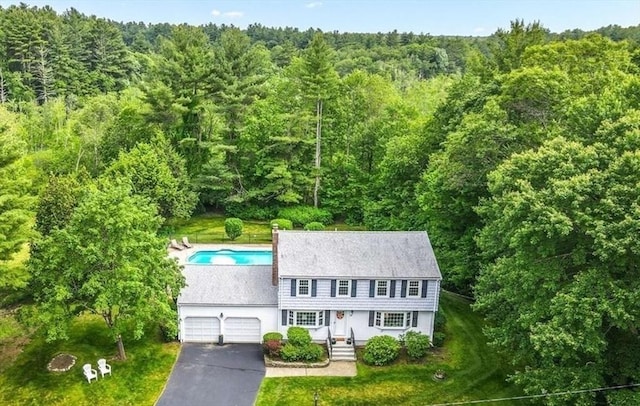24 Stagecoach, Medfield, MA 02052 - view of subject property featuring a heavily wooded area