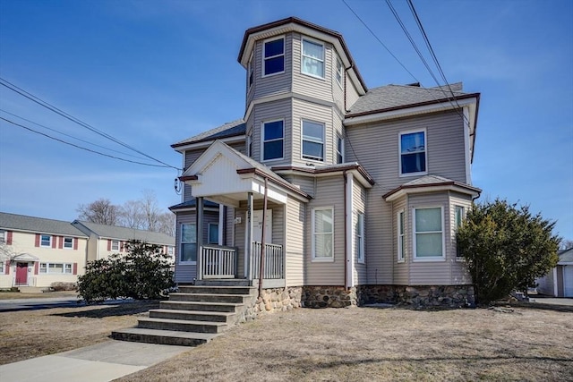 victorian home featuring covered porch