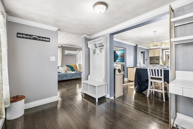 hall featuring crown molding, dark hardwood / wood-style floors, and a wall mounted AC