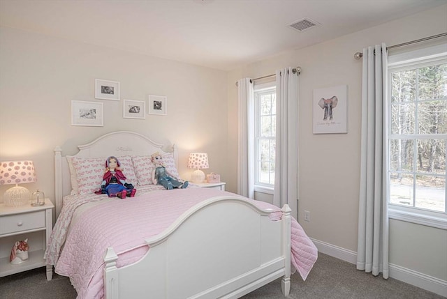 bedroom featuring carpet