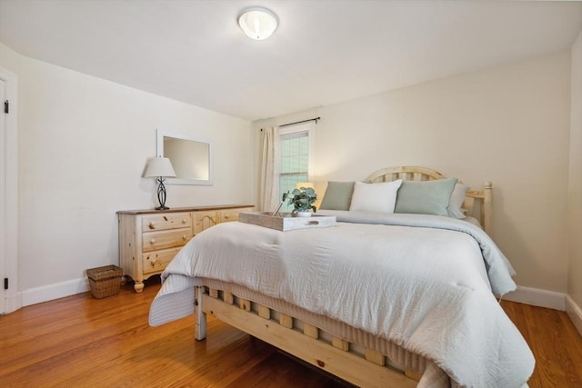 25 Piety Corner Rd, Waltham, MA 02451 - bedroom featuring baseboards and light wood finished floors