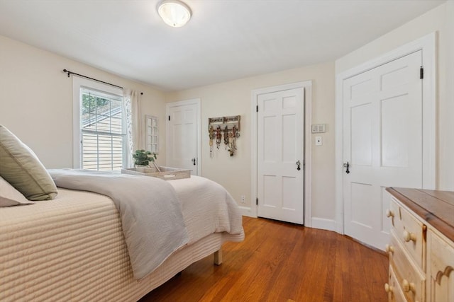 25 Piety Corner Rd, Waltham, MA 02451 - bedroom featuring light wood-style flooring and baseboards