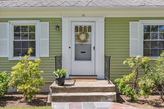 25 Piety Corner Rd, Waltham, MA 02451 - property entrance featuring roof with shingles
