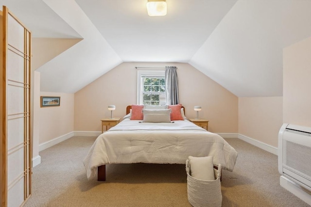 25 Piety Corner Rd, Waltham, MA 02451 - bedroom with light colored carpet, baseboards, lofted ceiling, and a wall unit AC
