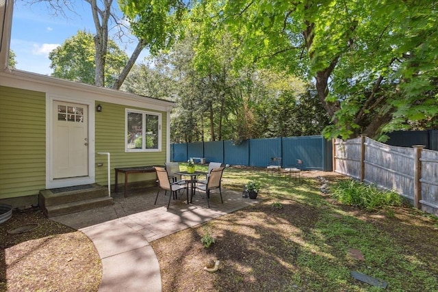 25 Piety Corner Rd, Waltham, MA 02451 - fenced backyard with entry steps and a patio