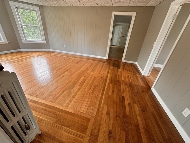 19 Chapel St, Shirley, MA 01464 - unfurnished room featuring hardwood / wood-style flooring and wooden walls