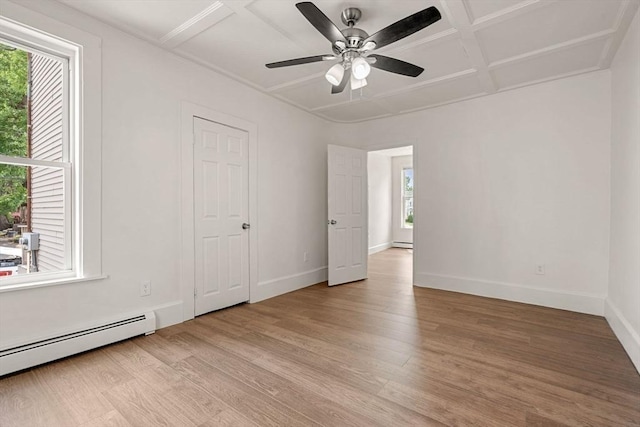 50 Howard St, Haverhill, MA 01830 - unfurnished room featuring coffered ceiling, a baseboard radiator, light wood-type flooring, ceiling fan, and a baseboard heating unit