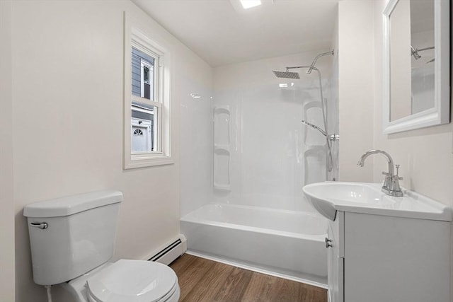 50 Howard St, Haverhill, MA 01830 - full bath featuring vanity, baseboard heating, wood finished floors, and tub / shower combination