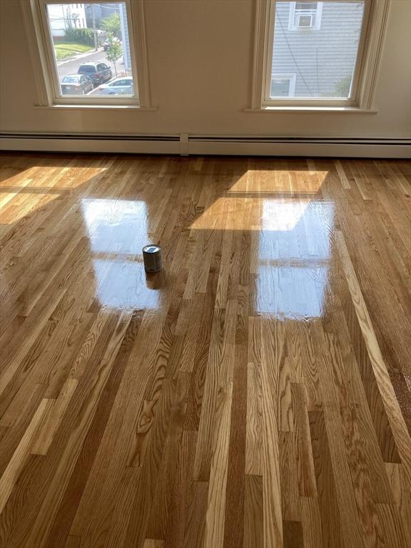 50 Howard St, Haverhill, MA 01830 - spare room featuring wood finished floors