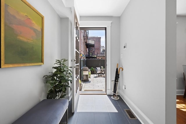 256 W Newton St Unit 1, Boston, MA 02116 - entryway featuring baseboards and tile patterned flooring