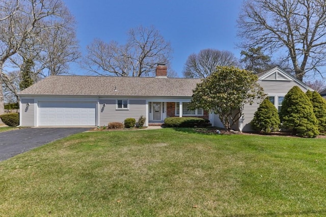 56 Fairwood Rd, Yarmouth, MA 02664 - single story home featuring a front lawn, a chimney, a garage, a shingled roof, and aphalt driveway