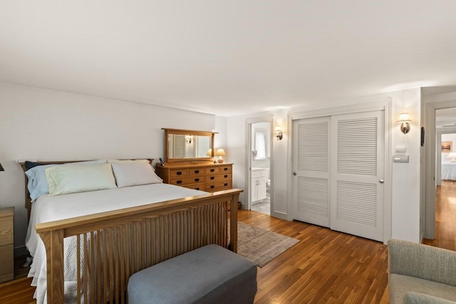 56 Fairwood Rd, Yarmouth, MA 02664 - bedroom featuring wood finished floors, a closet, and connected bathroom