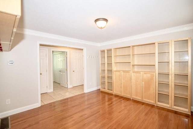 12 Kestrel Ln Unit 7, Westford, MA 01886 - spare room with ornamental molding, wood finished floors, and baseboards