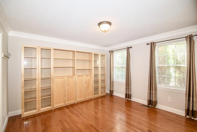 12 Kestrel Ln Unit 7, Westford, MA 01886 - spare room with wood finished floors, crown molding, and baseboards
