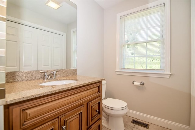 12 Kestrel Ln Unit 7, Westford, MA 01886 - bathroom with tile patterned flooring, toilet, vanity, and baseboards