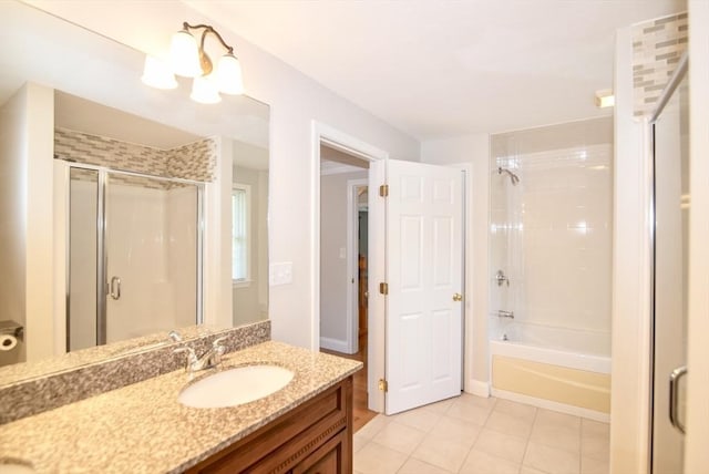 12 Kestrel Ln Unit 7, Westford, MA 01886 - bathroom featuring tile patterned flooring, vanity, and combined bath / shower with glass door