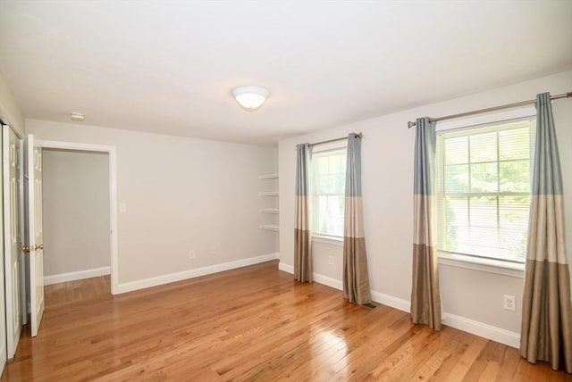 12 Kestrel Ln Unit 7, Westford, MA 01886 - unfurnished bedroom featuring light wood-type flooring and baseboards