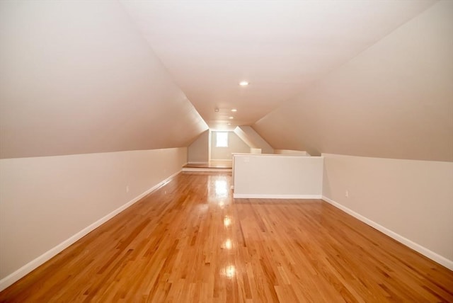 12 Kestrel Ln Unit 7, Westford, MA 01886 - additional living space featuring baseboards, light wood-type flooring, lofted ceiling, and recessed lighting