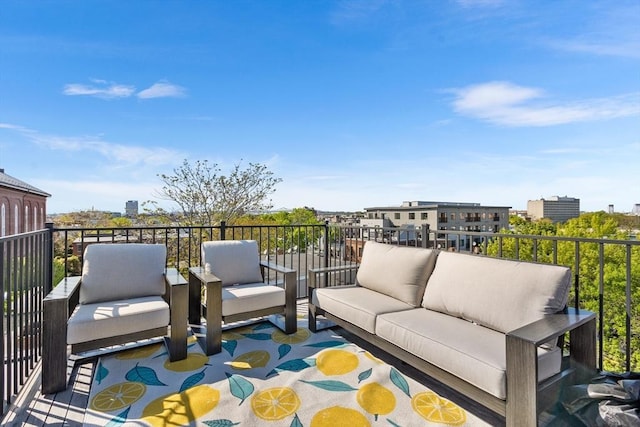 wooden deck with an outdoor living space