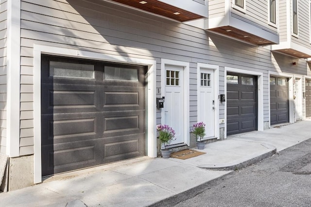 garage with driveway