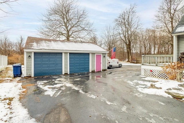 view of snow covered garage