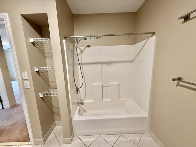 211 Central Unit A210, Norwood, MA 02062 - full bath featuring baseboards, shower / washtub combination, and tile patterned flooring