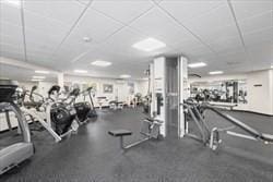 211 Central Unit A210, Norwood, MA 02062 - exercise room featuring a paneled ceiling
