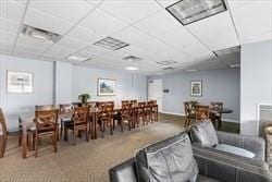 211 Central Unit A210, Norwood, MA 02062 - dining space featuring a drop ceiling