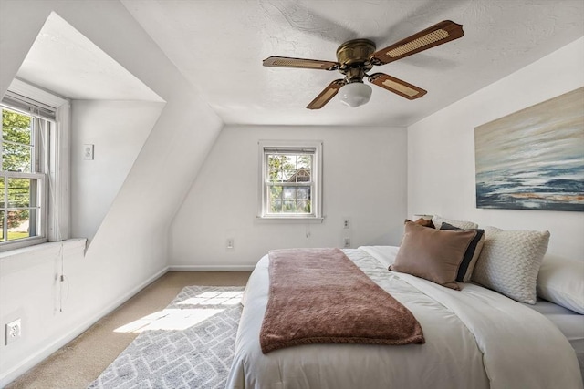 225 W Main St, Dudley, MA 01571 - bedroom with multiple windows, carpet floors, vaulted ceiling, and a ceiling fan
