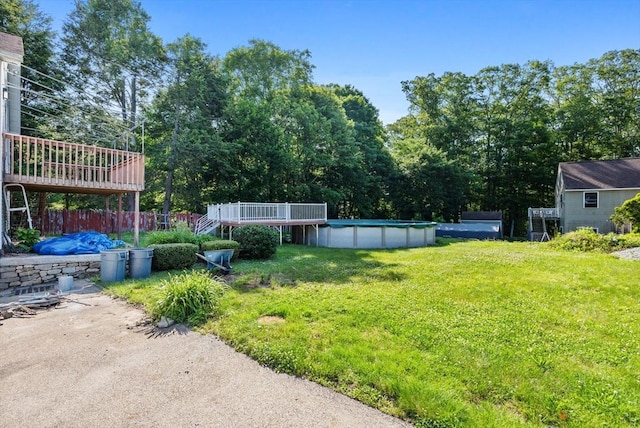 225 W Main St, Dudley, MA 01571 - view of grassy yard featuring a covered pool and a deck