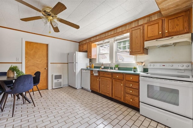225 W Main St, Dudley, MA 01571 - kitchen featuring white appliances, under cabinet range hood, brick patterned floors, brown cabinets, and ornamental molding