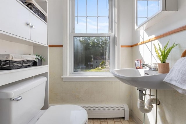 225 W Main St, Dudley, MA 01571 - bathroom with a baseboard heating unit and toilet