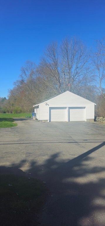 163 Baker Rd W, Taunton, MA 02780 - exterior space with an outdoor structure and a garage