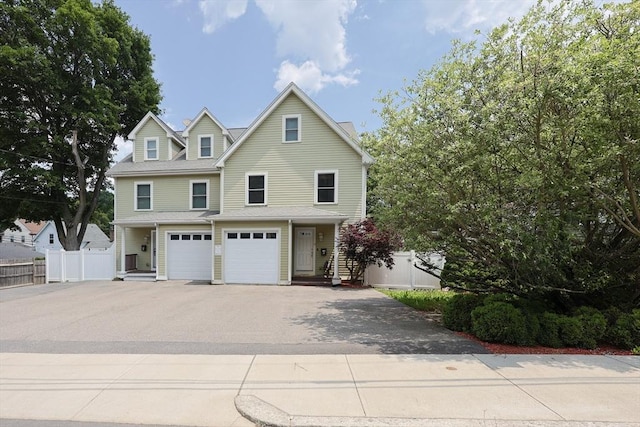 41 Webber St Unit 2, Malden, MA 02148 - view of front facade with asphalt driveway and an attached garage
